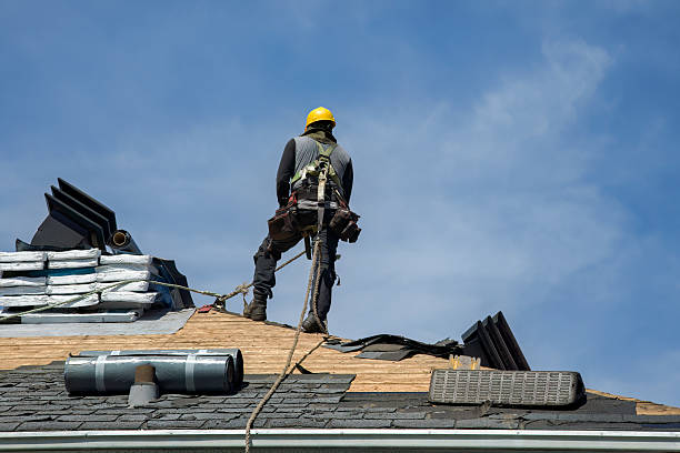 Professional Roofing technician working in Badger, IA